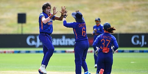 Jhulan Goswami celebrates with teammates after taking a wicket during the Indian women's tour of New Zealand. (Photo | AFP)