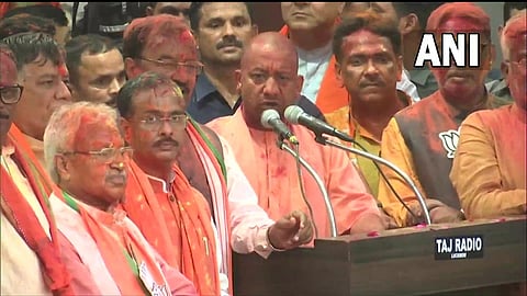 Chief Minister Yogi Adityanath addressing the party workers after the victory on Thursday. (Photo | ANI Twitter)