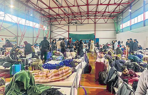 Indian nationals gather at a shelter in Romanian capital Bucharest after getting evacuated. (Photo | PTI)