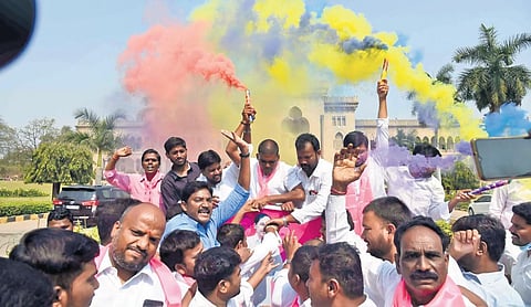 Activists of the TRSV, the students wing of the TRS, celebrate in front of the Arts College, Osmania University, on Wednesday