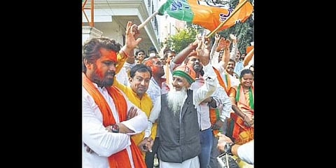 BJP activists celebrate the results in Hyderabad on Thursday.(Photo | Vinay Madapu)
