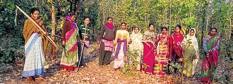Kandoni Soren (fourth from left) out in the forest with her team of woman volunteers | EXPRESS