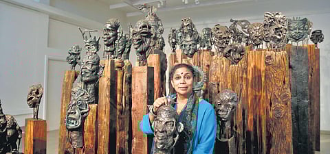 Artist Nivedita Mishra with her artwork showcasing 64 Yoginis (Photo | EPS, Shekhar Yadav)