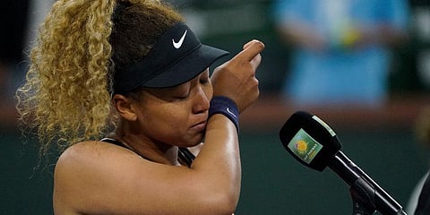 Naomi Osaka, of Japan, is emotional as she speaks to the crowd after losing her match to Veronika Kudermetova, of Russia, Mar 12, 2022, in Indian Wells, California. (Photo | AP)