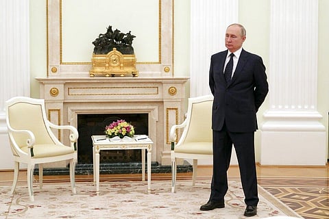 Russian President Vladimir Putin stands while waiting for Belarusian President Alexander Lukashenko prior to their talks in Moscow, on March 11(Photo | AP)