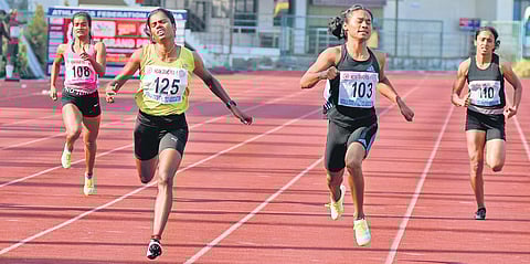 Tamil Nadu’s Dhanalakshmi (second left) and Hima Das (second right) during their 200m event at the Indian GP at Thiruvananthapuram on Sunday. ( Photo | EPS)