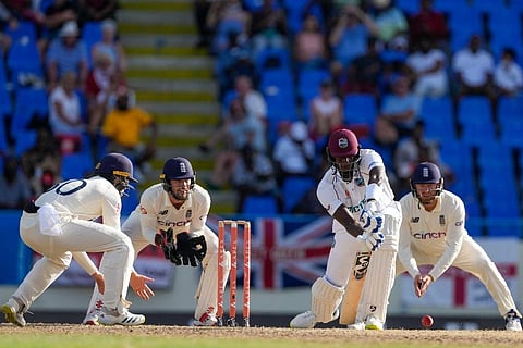 West Indies' Jason Holder plays a shot against England during day five of their first cricket Test match. ( Photo | AP)