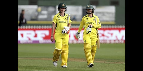 Australia's Rachael Haynes (R) and Beth Mooney walk from the field after their win during the 2022 World Cup match between the West Indies and Australia on March 15, 2022.(Photo| AFP)