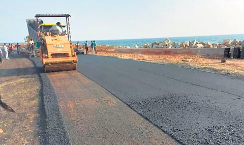Tarring in progress on the Shankhumukham-domestic terminal road | pic courtesy: trivandrum Indian Facebook page