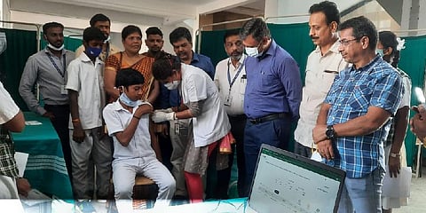 Students getting vaccinated.