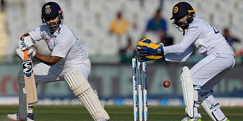 India's Rishabh Pant plays a shot during the first test match between India and Sri Lanka in Mohali. (Photo | AP)