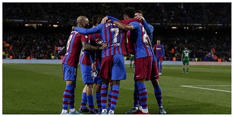 Barcelona's Pierre-Emerick Aubameyang celebrates after scoring with his teammates during a Spanish La Liga soccer match between FC Barcelona and Osasuna at the Camp Nou stadium in Barcelona (AP Photo)