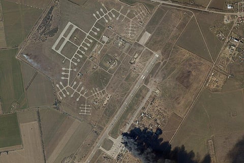 In this satellite picture from Planet Labs PBC, fire and smoke is seen at Kherson International Airport and Air Base in Kherson, Ukraine, Tuesday, March 15, 2022(Photo | AP)