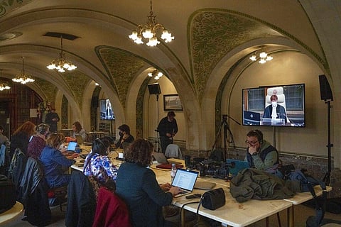 Journalists listen to Presiding judge Joan Donoghue, on screen, as she reads the ruling of the United Nations' top court in The Hague. (Photo | AP)