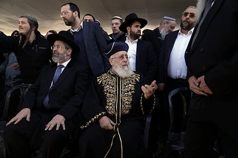 Yitzhak Yosef the Sephardi Chief Rabbi of Israel, center, attends in a protest against religious reforms, in Jerusalem. ( Photo | AP)