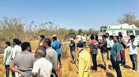 People gather near the spot where Srinivas and Raghavender were shot dead in Ibrahimpatnam on Tuesday, March 1, 2022.