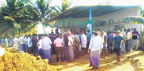 Friends, relatives and neighbours throng Naveen Gyana Goudar’s house in Chalageri, Haveri district, on Tuesday | Express