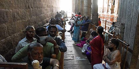 Devotees waiting in ‘paid darshan’ queue at the temple on Tuesday | MK Ashok Kumar