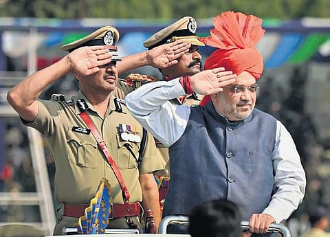 Union Home Minister Amit Shah during the parade at Maulana Azad Stadium in Jammu on Saturday. ( Photo | PTI)