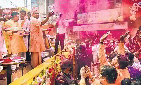 Yogi Adityanath celebrates Holi with BJP supporters in Gorakhpur on Saturday. ( Photo | PTI)