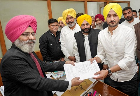 Former Indian cricketer and AAP leader Harbhajan Singh files his nomination papers for Rajya Sabha MP from Punjab. (Photo | PTI)