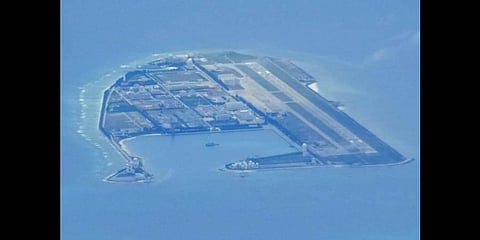 Chinese structures and buildings at the man-made island on Mischief Reef at the Spratlys group of islands in the South China Sea are seen on Sunday March 20, 2022(Photo | AP)