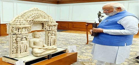 Prime Minister Narendra Modi inspects antiquities repatriated from Australia, in New Delhi on Monday. (Photo | PTI)