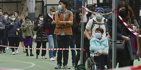 Residents queue up to get tested for the coronavirus at a temporary testing center for COVID-19 in Hong Kong, Thursday, Feb. 10, 2022. (Photo | AP)