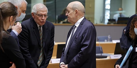 European foreign policy chief Josep Borrell, left, speaks with French Foreign Minister Jean-Yves Le Drian during a meeting of the EU foreign ministersin Brussels,Mar. 21, 2022.(Photo | AP)