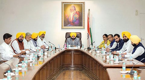 Punjab Chief Minister Bhagwant Mann with his Cabinet ministers during the first Cabinet meeting, in Chandigarh. (Photo | PTI)