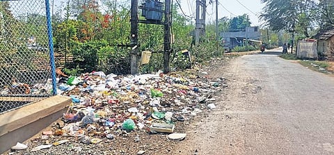 Garbage strewn along the road in ward 15 of Baripada town | Express