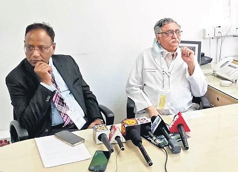 Deepak Gupta with Dr Shashank Sharad Kale, Head of the Department of Neurosurgery, AIIMS, during a press conference | Express