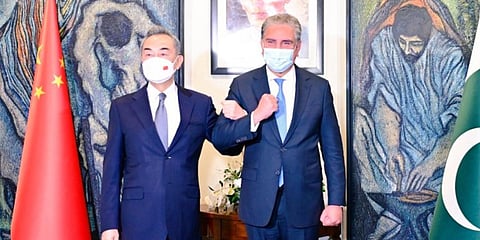 Pakistan's Foreign Minister Shah Mahmood Qureshi (R) and Chinese counterpart Wang Yi. (Photo| Twitter)