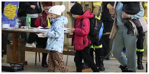 Children from Ukraine receive soup at a railway station in Przemysl, southeastern Poland, on Wednesday, March 23, 2022. (Photo | AP)