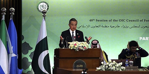 Chinese Foreign Minister Wang Yi speaks at the start of a two-day gathering of the Islamic Cooperation, at the Parliament House in Islamabad, Pakistan, Tuesday, March 22, 2022.(Photo | AP)