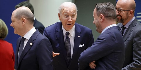 U.S. President Biden, center, speaks with from left, German Chancellor, Luxembourg's PM and European Council President during a round table meeting at an EU summit in Brussels.(Photo | AP)