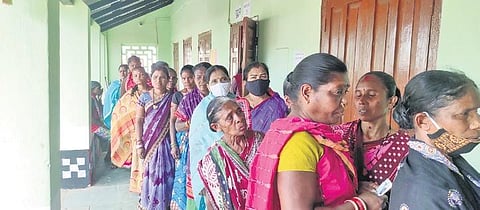 Women line up to cast vote at a polling booth in Jeypore | Express