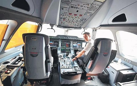 A pilot sits inside an Airbus plane on Thursday