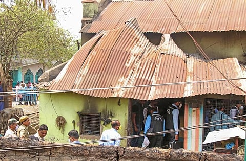 CBI's Central Forensic Science Laboratory's (CFSL) experts collect samples from the houses where eight people were burned alive. (Photo | PTI)