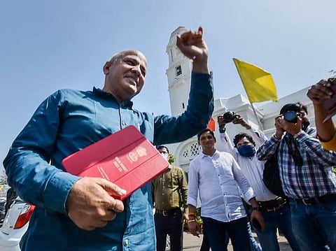 Delhi Deputy CM and Finance Minister Manish Sisodia arrives to present the annual budget 2022-23 in Delhi Assembly. (Photo | PTI)