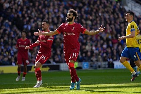 Liverpool's Mohamed Salah celebrates after scoring his side's second goal on a penalty kick during the English Premier League. (Photo | AP)