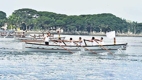 Navy sailors participate in the pulling regatta organised by the Southern Naval Command in Kochi on Saturday