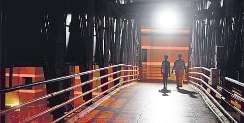 The foot overbridge near Kasthurba Nagar MRTS station has been cleaned and now is better illuminated. (Photo | EPS)