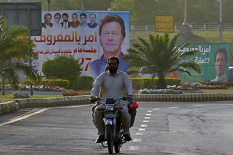 Billboard show pictures of of Pakistan's Prime Minister Imran Khan near the National Assembly, in Islamabad, Pakistan. (Photo | AP)