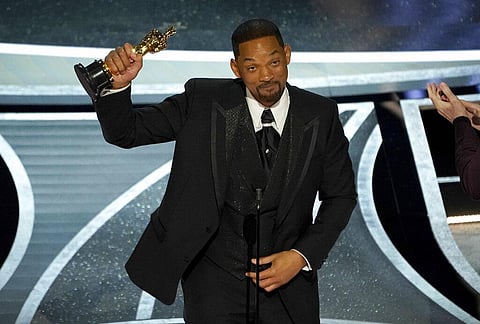 Will Smith accepts the award for best performance by an actor in a leading role for 'King Richard' at the Oscars 2022(Photo | AP)