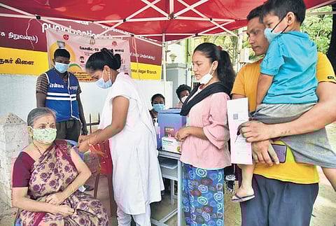 A health worker from the Greater Chennai Corporation administers the Covid-19 vaccine at a recent special camp in Thirumangalam in the city | P Jawahar