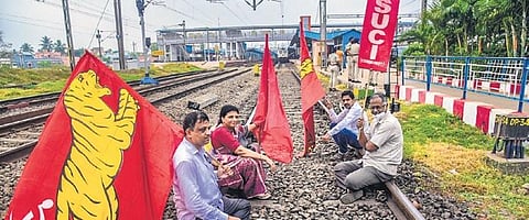 Protestors stage rail roko at Bhubaneswar Railway Station on first day of Bharat Bandh called by trade unions. (Photo | EPS)