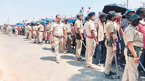 Police personnel deployed at Kukuda Gate level-crossing site. ( Photo| EPS)