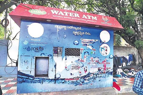 An Any Time Water Kiosk lies unoperational in Hyderabad. ( Photo | EPS)