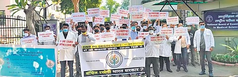 Doctors protest outside the National Board of Examinations office alleging irregularities in exams. (Photos | Express)